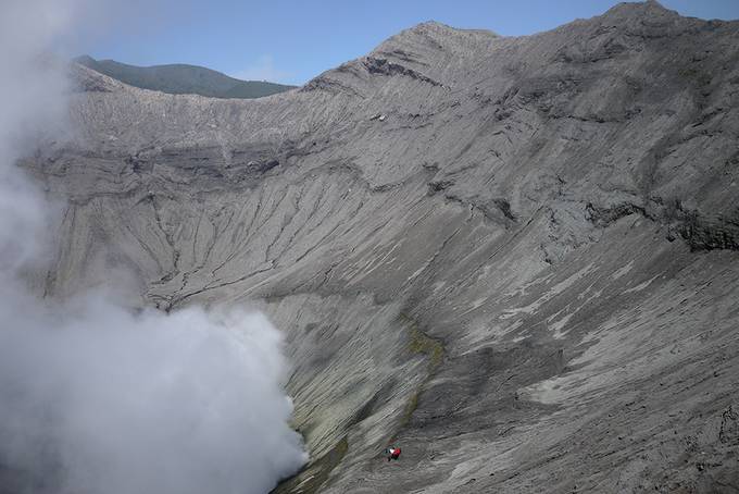 Smoke in the volcano crater Smoke in the volcano crater
