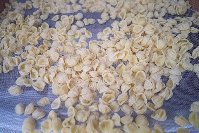 Orecchiette pasta drying in the sun Orecchiette pasta drying in the sun